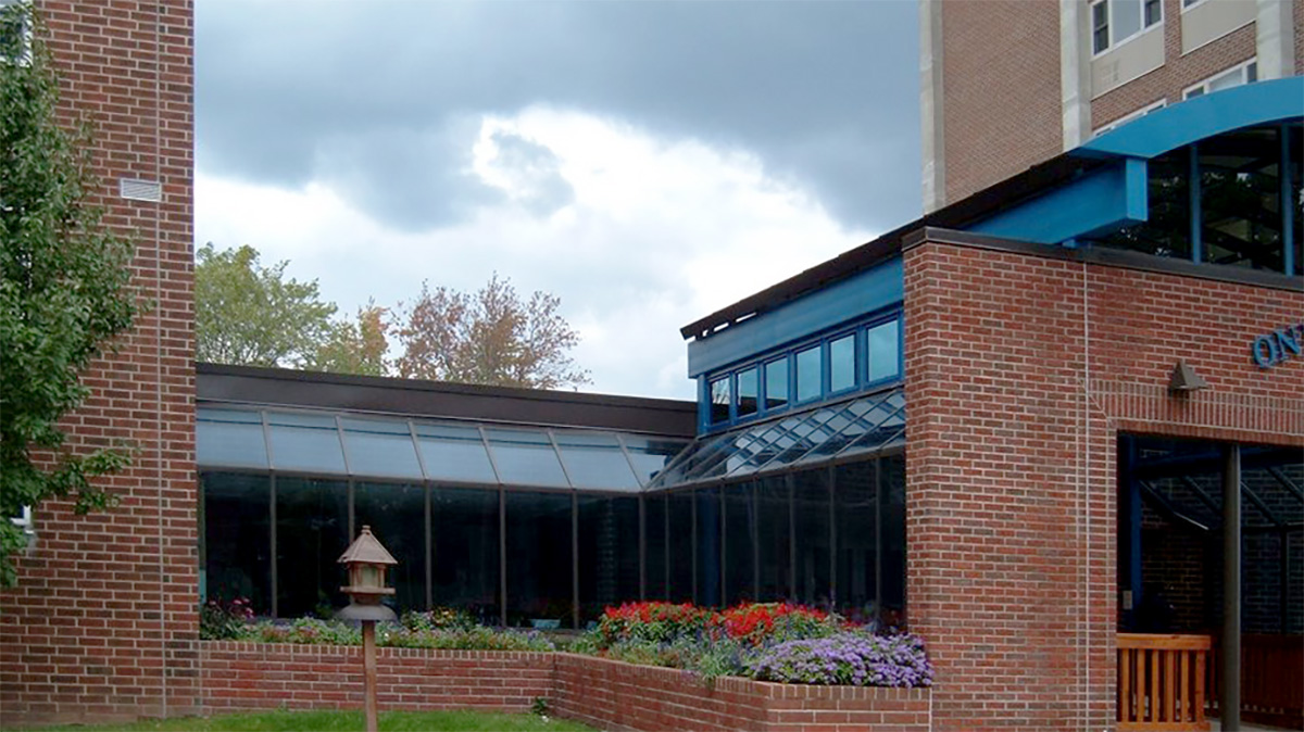 Lean-to Solarium at Oneida Towers Oneida glazed structure