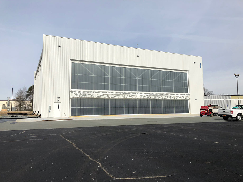 Polycarbonate hangar doors Cirrus Aircraft Hangar
